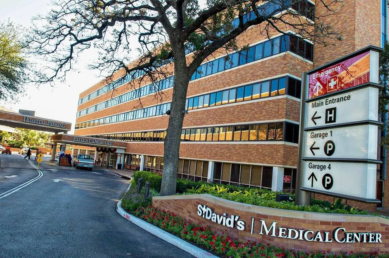 Entrance of St. David's Medical Center in Austin with hospital wayfinding signs